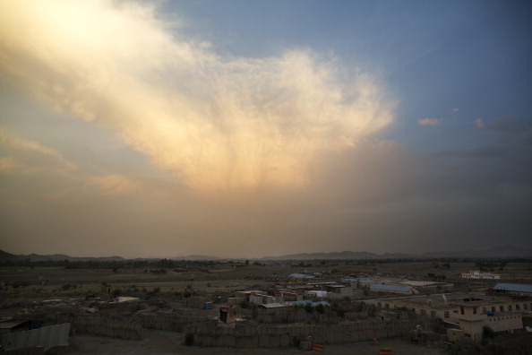 Clouds gather over the U.S. and Afghan base COP Sabari in the Sabari district of Khost province, Afghanistan, on Tuesday, June 25, 2013. 