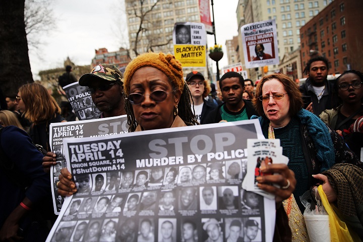 Protesters against police violence march in Manhattan on April 14, 2015 in New York City. A coalation of anti police violence and anti racist organizations gathered in Union Square to listen to speakers before setting off on a march down lower Broadway. 