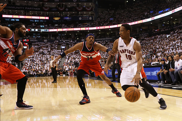 DeMar DeRozan #10 of the Toronto Raptors handles the ball against the Washington Wizards during Game One of the Eastern Conference Quarterfinals of the 2015 NBA Playoffs at the Air Canada Centre on April 18, 2015 in Toronto, Ontario, Canada.
