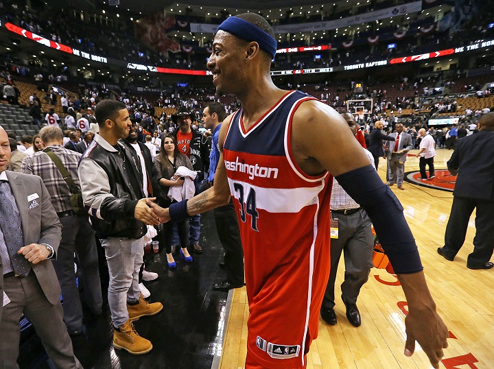 Drake shakes the hand of Paul Pierce #34 of the Washington Wizards after Game Two of the Eastern Conference Quarterfinals against the Toronto Raptors during the 2015 NBA Playoffs on April 21, 2015 at the Air Canada Centre in Toronto.