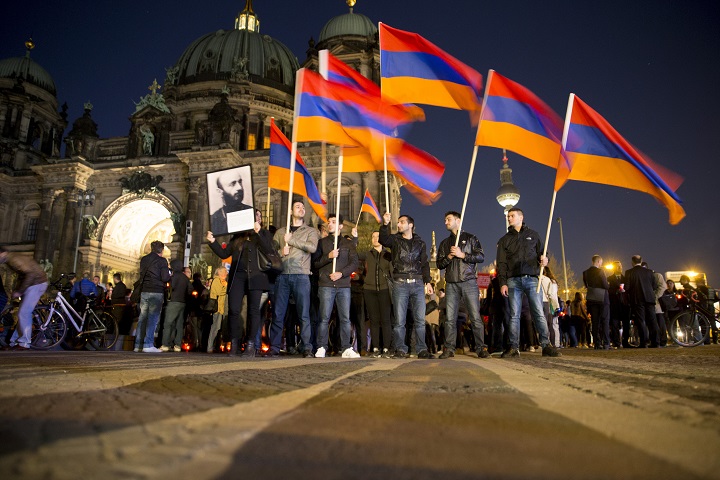 Demonstrators protest after an ecumenical religious service commemorating the genocide against Armenians, Assyrians and Ottoman Greeks in Front of the Dom Cathedral on April 23, 2015 in Berlin, Germany. In a historic shift leading politicians in Germany have in recent days publicly accepted the use of the term "genocide" to describe the murder of over one million Armenians by Ottoman Turks beginning in 1915. The issue is highly sensitive in Turkey, where the current government accepts that large-scale crimes against the Armenian minority took place but does not accept the term "genocide. 