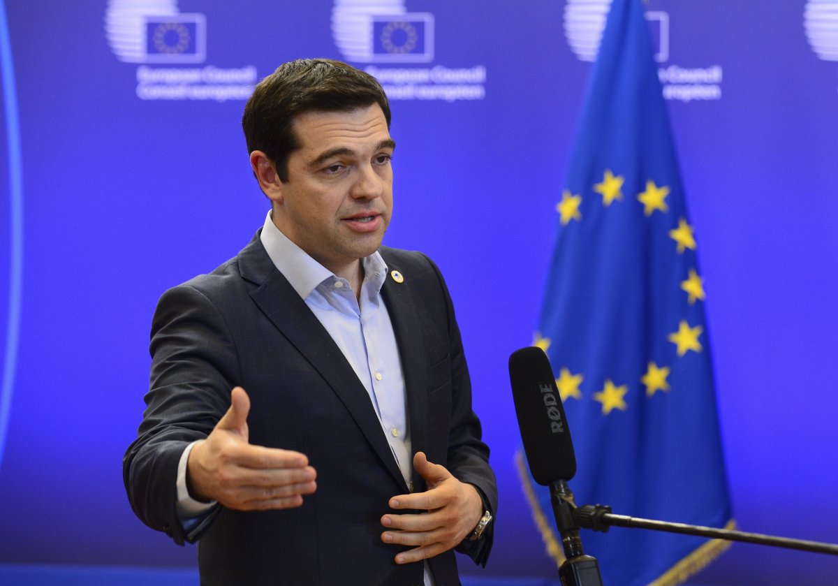 Greek Prime Minister Alexis Tsipras speaks during a press conference during a European Union summit at the EU headquarters in Brussels on April 23, 2015.
