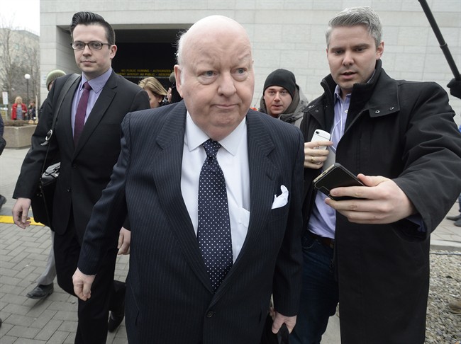 Suspended senator Mike Duffy leaves the courthouse after the second day of his trial in Ottawa on Wednesday, April 8, 2015. THE CANADIAN PRESS/Adrian Wyld.
