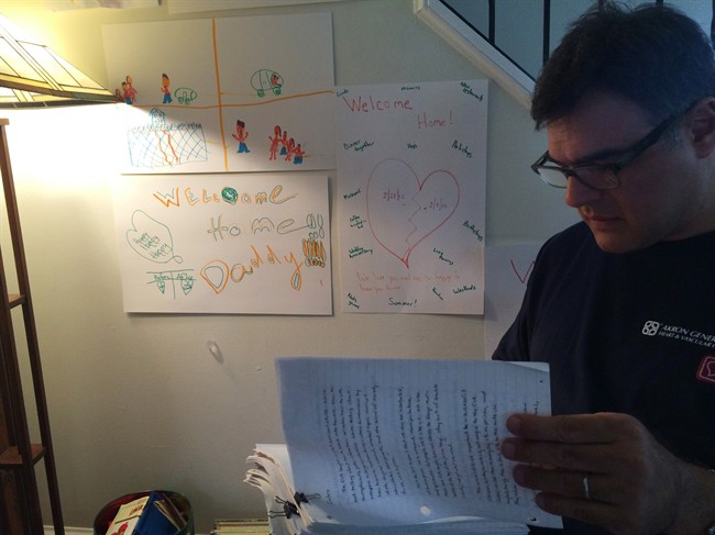 Former CIA agent John Kiriakou, goes through a manuscript about a book on his two years in prison at his home in Arlington, Va. on March 26, 2015. Kiriakou says multiple people within the agency protested the detention, rendition and torture of Canadian Maher Arar, but says they were ruled out. 