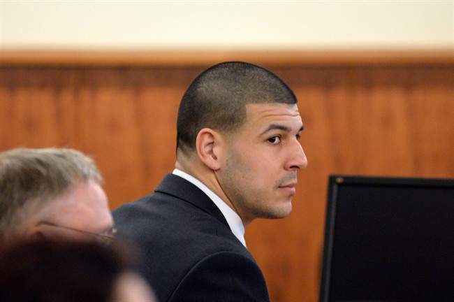 Former New England Patriots football player Aaron Hernandez appears in the court room of the Bristol County Superior Court House in Fall River, Ma., before the jury begin their deliberations, Wednesday, April 8, 2015.