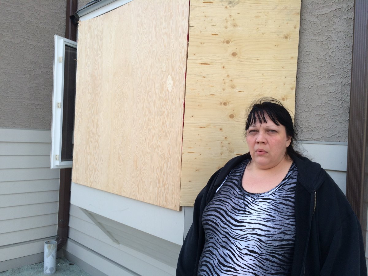 Bridgette Cyr said one of the intruders smashed the front window with a sword. 