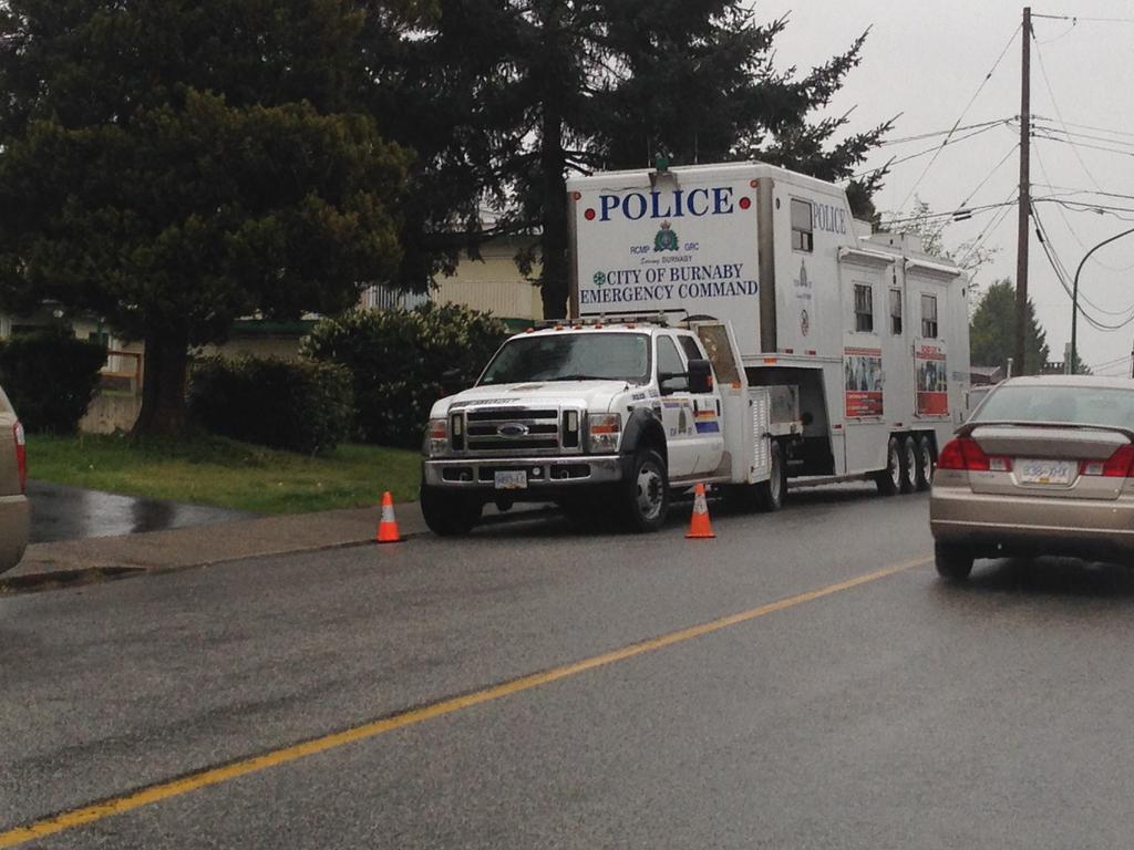 Investigators fan out in Burnaby neighbourhood after two random acts of violence - image