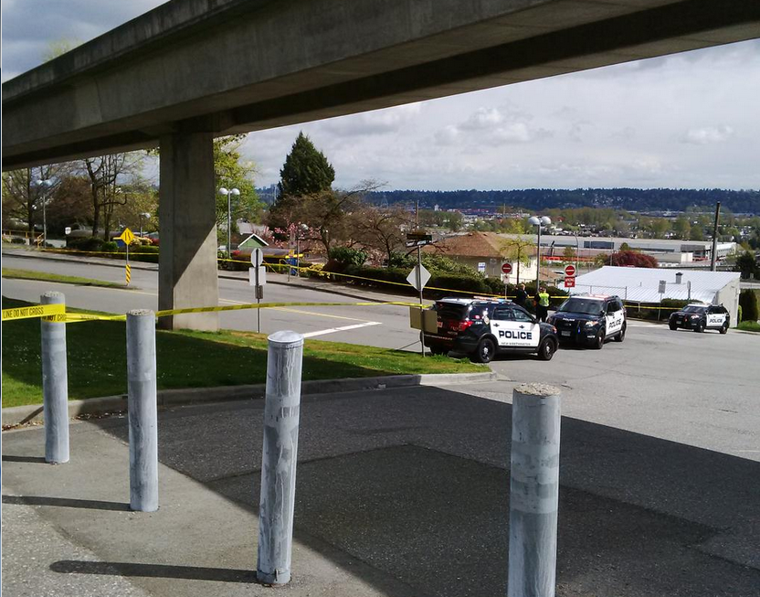New Westminster Police investigate a drive-by shooting that happened near the 22nd Street station bus loop on April 11, 2015.