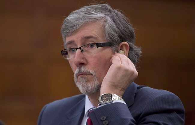 Privacy Commissioner Daniel Therrien waits to appear at the Commons science and technology committee to discuss the Digital Privacy Act, on Parliament Hill in Ottawa, Tuesday February 17, 2015. 
