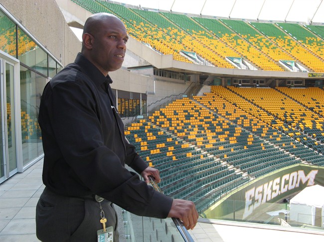 Edmonton Eskimos general manager Ed Hervey looks over Commonwealth Stadium in Edmonton on August 1, 2013.