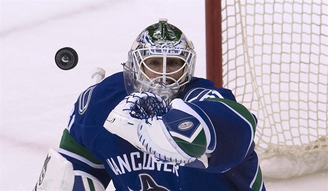 Vancouver Canucks goalie Eddie Lack, seen here making a save during a shootout against the L.A. Kings last week, will get the start in goal for the Vancouver Canucks tonight in Game 1 of their first-round series with the Calgary Flames. 