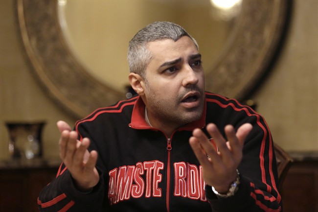 Canadian Al-Jazeera English journalist Mohamed Fahmy, speaks during an interview with The Associated Press in Cairo, Egypt, Thursday, Feb. 19, 2015.