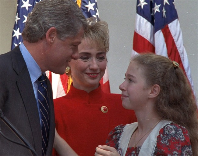 Bill Clinton is joined by wife, Hillary, and daughter Chelsea, right, in Little Rock, Ark. on the day he announced his bid for the presidency in this Nov. 3, 1991 file photo. 
