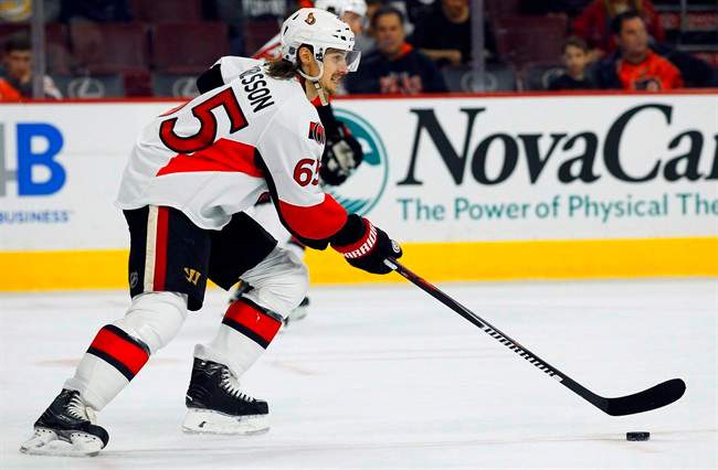 Ottawa Senators' Erik Karlsson takes th epuck up ice in the second period of an NHL hockey game against the Philadelphia Flyers in Philadelphia on April 11, 2015.