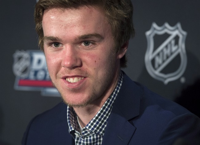 Connor McDavid speaks to reporters following the announcement of the NHL Draft Lottery in Toronto on Saturday, April 18, 2015.