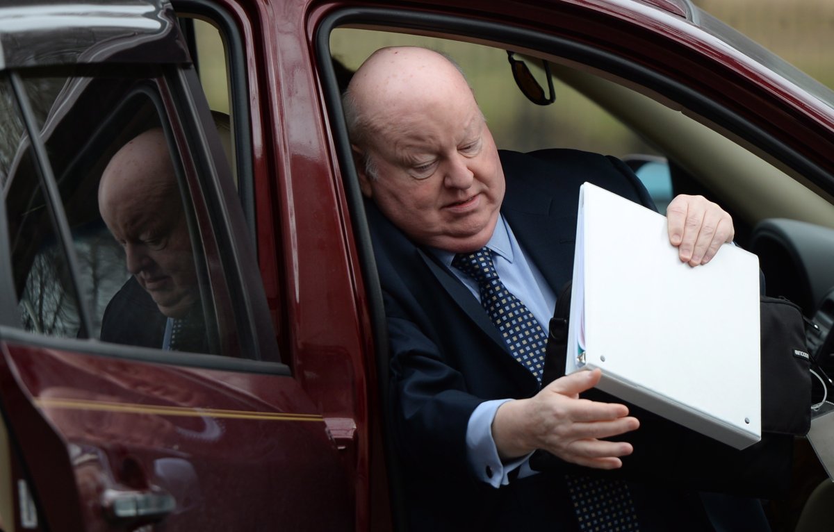 Suspended senator Mike Duffy arrives at court in Ottawa on Monday, April 27, 2015. Duffy is facing 31 charges of fraud, breach of trust, bribery, frauds on the government related to inappropriate Senate expenses. THE CANADIAN PRESS/Sean Kilpatrick.
