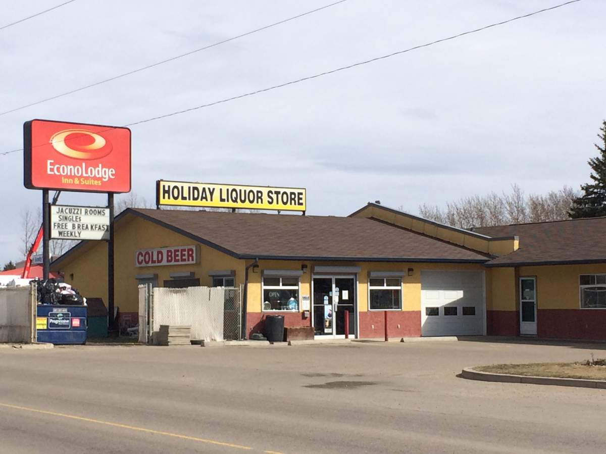 Police have charged a man and a woman with human trafficking, in connection with the alleged abuse of eight temporary foreign workers at an Econo Lodge on Gasoline Alley in Red Deer County. April 17, 2015.