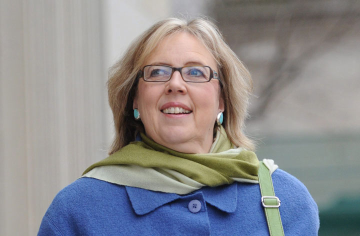 Green Party leader Elizabeth May leaves a press conference at the National Press Theatre in Ottawa on Thursday, December 1, 2011.