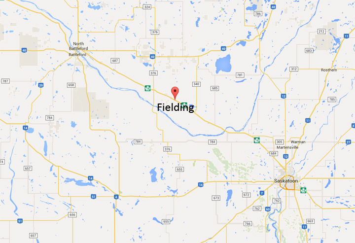 A 35-year-old woman is dead after a two vehicle collision near Fielding, Sask. Friday.