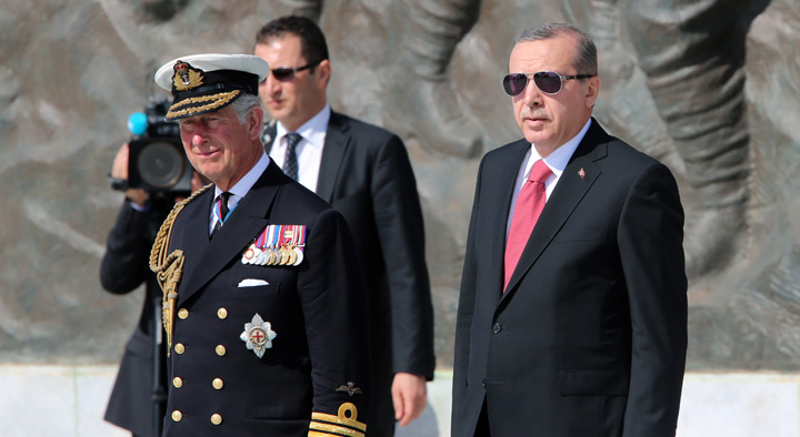 Prince of Wales, left, and Turkish President Recep Tayyip Erdogan watch military parades during the Turkish International Service at Mehmetcik Abide in the Gallipoli Peninsula, Turkey, Friday, April 24, 2015.