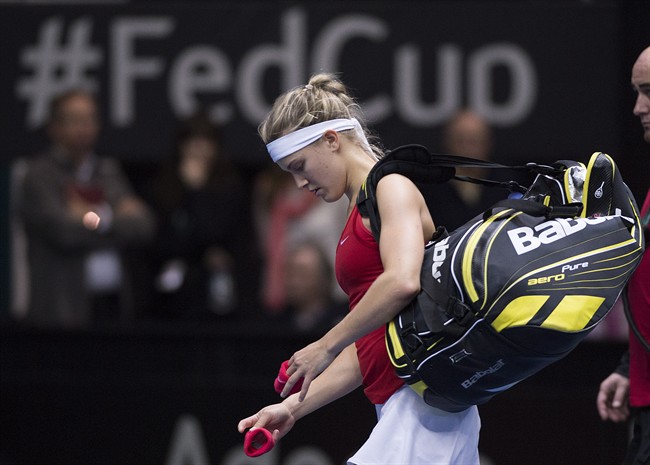 Canada's Eugenie Bouchard walks off the court after losing her Fed Cup tennis match to Romania's Andreea Mitu in Montreal, Sunday, April 19, 2015.
