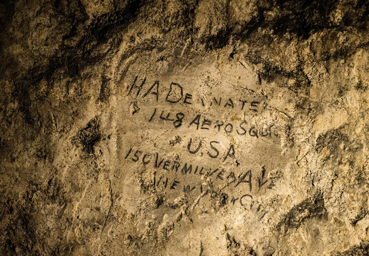 This picture taken on Feb. 20, 2015 shows a name from the First World War, H.A. Deanate, 148th Aero Squadron, USA, engraved on the walls of a former chalk quarry, at the Cite Souterraine, in Naours, northern France.