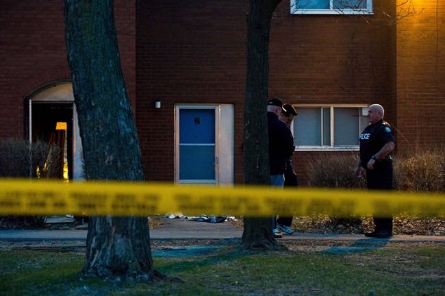 Police officers at the scene of the shooting on April 16, 2015.