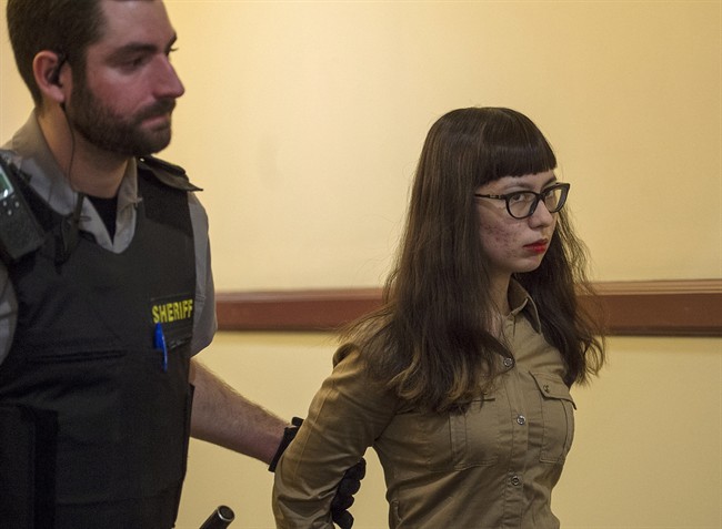 Kantha Souvannarath of Geneva, Ill. attends provincial court in Halifax on Thursday, April 16, 2015. 