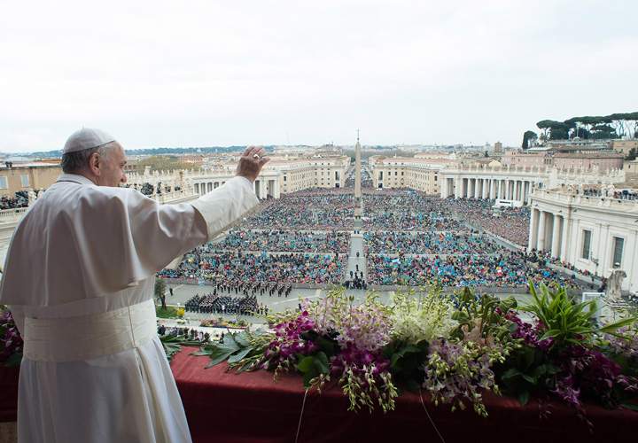 Pope Francis delivers the Urbi et Orbi (to the city and to the world) blessing at the end of the Easter Sunday Mass in St. Peter’s Square at the Vatican , Sunday, April 5, 2015.