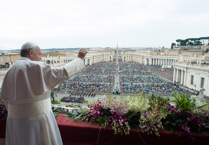 Pope Francis delivers a blessing at the end of the Easter Sunday Mass in St. Peter's Square at the Vatican, Sunday, April 5, 2015.