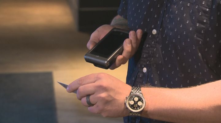 An ID is scanned at the entrance to MKT in Edmonton on Tuesday, April 14, 2015.