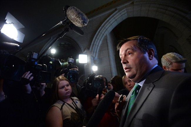 Jason Kenney apologized for saying only Canada among the U.S. allies had the technology to use smart-bombs in Syria.