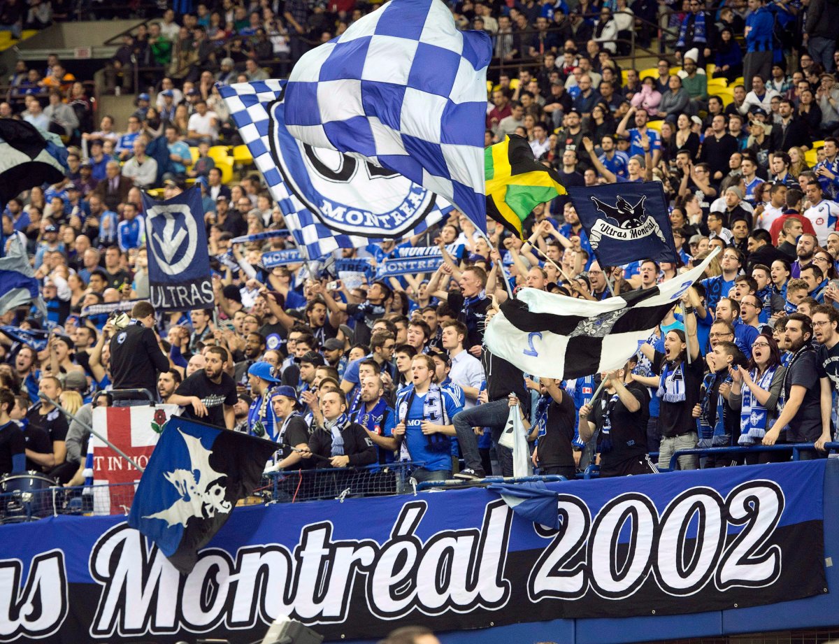 Montreal Impact fans celebrate during a 2-0 win over Alajuelense in March. 