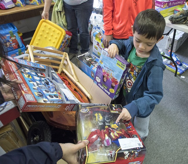 Rosco Martin, 5, choses a toy at the final sale of the Canadian Toy Testing Council on Saturday, April 18, 2015.