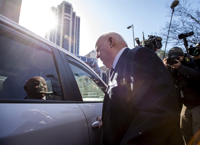 Suspended senator Mike Duffy leaves the courthouse in Ottawa, Ont. following his first court appearance on Tuesday, April 7, 2015. Duffy is facing 31 charges of fraud, breach of trust, bribery, frauds on the government related to inappropriate Senate expenses.