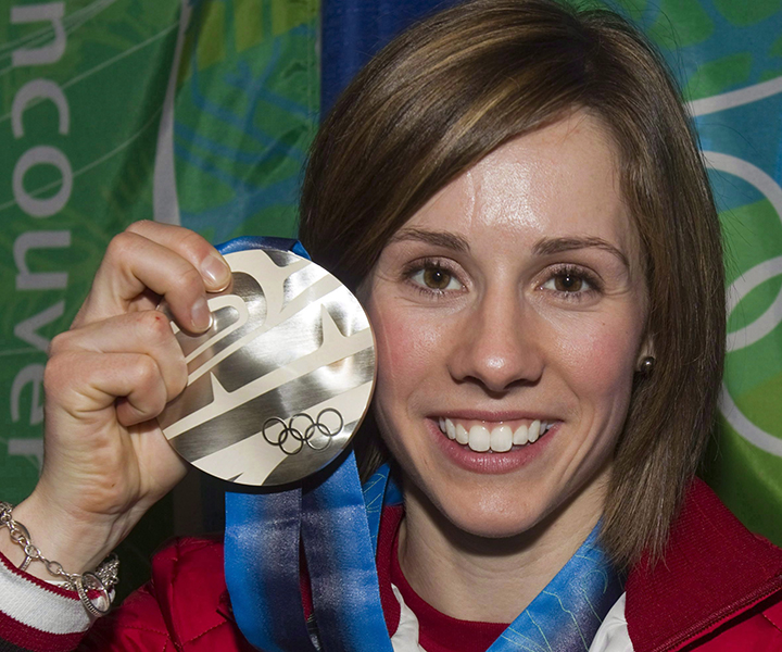 Canada's Jenn Heil shows her silver medal for ladies moguls in freestyle skiing Sunday Feb. 14, 2010 at the 2010 Vancouver Olympic Winter Games. 