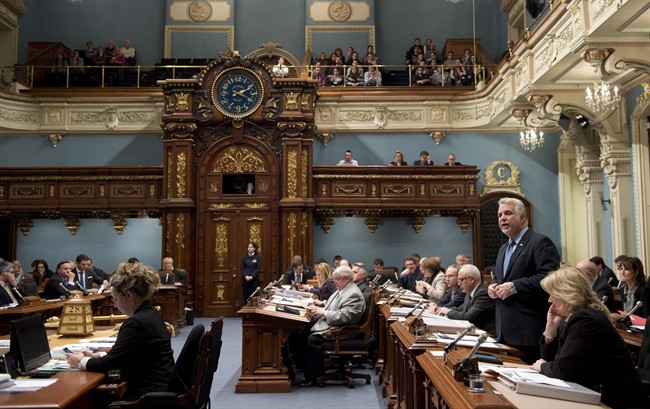 Quebec Premier Philippe Couillard speaks during question period Tuesday, April 28, 2015 at the legislature in Quebec City. 