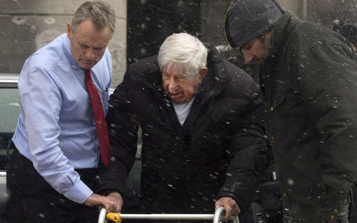Former Montreal Canadiens Elmer Lach arrives for the funeral service for Jean Beliveau, Wednesday, December 10, 2014 in Montreal. The Montreal Canadiens hockey legend passed away Tuesday, Dec. 2, 2014 at the age of 83.