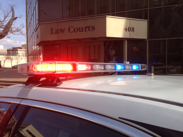 Winnipeg fire and police vehicles at the Law Courts for a report of a suspicious package on Wednesday, April 8, 2015