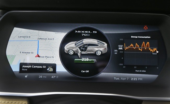 Tesla boosts range power and price of low-end Model S