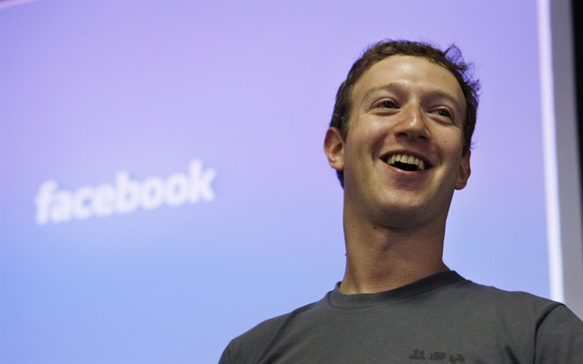 Facebook CEO Mark Zuckerberg smiles during an announcement at Facebook headquarters in Palo Alto, Calif. 