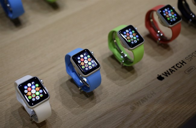 Varieties of the new Apple Watch appear on display in the demo room after an Apple event in San Francisco. Pre-orders for the Apple Watch start April 10.