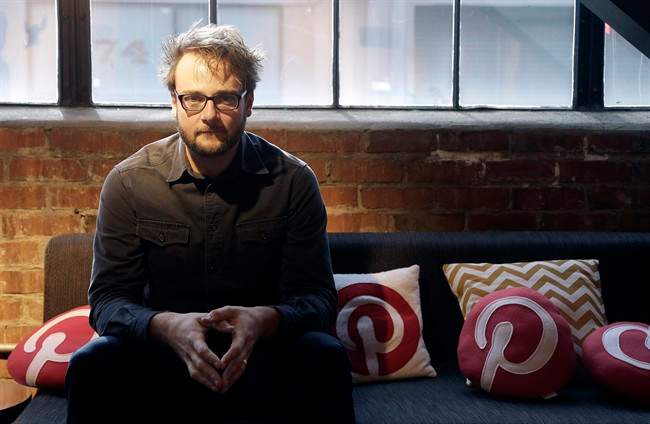 In this Nov. 13, 2014 photo, Pinterest co-founder Evan Sharp poses for photos at the Pinterest office in San Francisco. The San Francisco-based venture capital darling celebrated its fifth birthday in March 2015. 