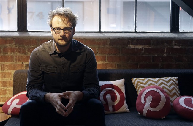 In this Nov. 13, 2014 photo, Pinterest co-founder Evan Sharp poses for photos at the Pinterest office in San Francisco. The San Francisco-based venture capital darling celebrated its fifth birthday in March 2015. 