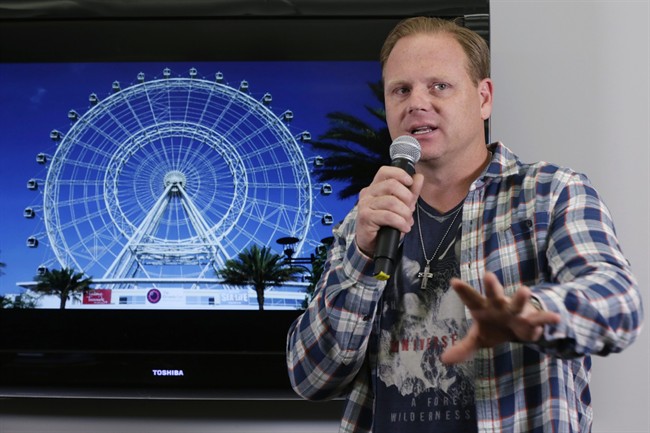 High-wire performer Nik Wallenda announces his latest stunt at the 400-foot Orlando Eye, during a news conference, in New York, Monday, April 13, 2015. 