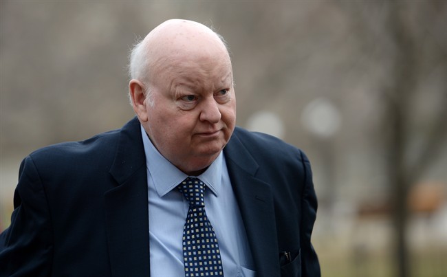 Suspended senator Mike Duffy arrives at court in Ottawa on Monday, April 27, 2015. 