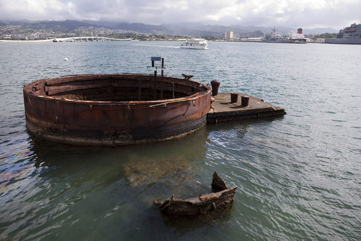 This Dec. 7, 2011 file photo shows a gun turret base from the USS Arizona in Pearl Harbor, Hawaii. The Pentagon is working to identify sailors and Marines killed in the attack on Pearl Harbor more than 70 years ago.