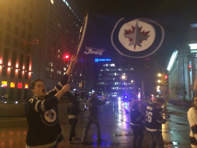 Portage Avenue and Main Street is a popular gathering spot for jubilant Jets fans, but it's not the best place to actually see the game.