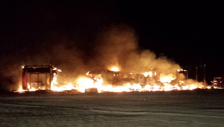 An early morning fire destroyed a truck stop just west of Paynton, Sask.