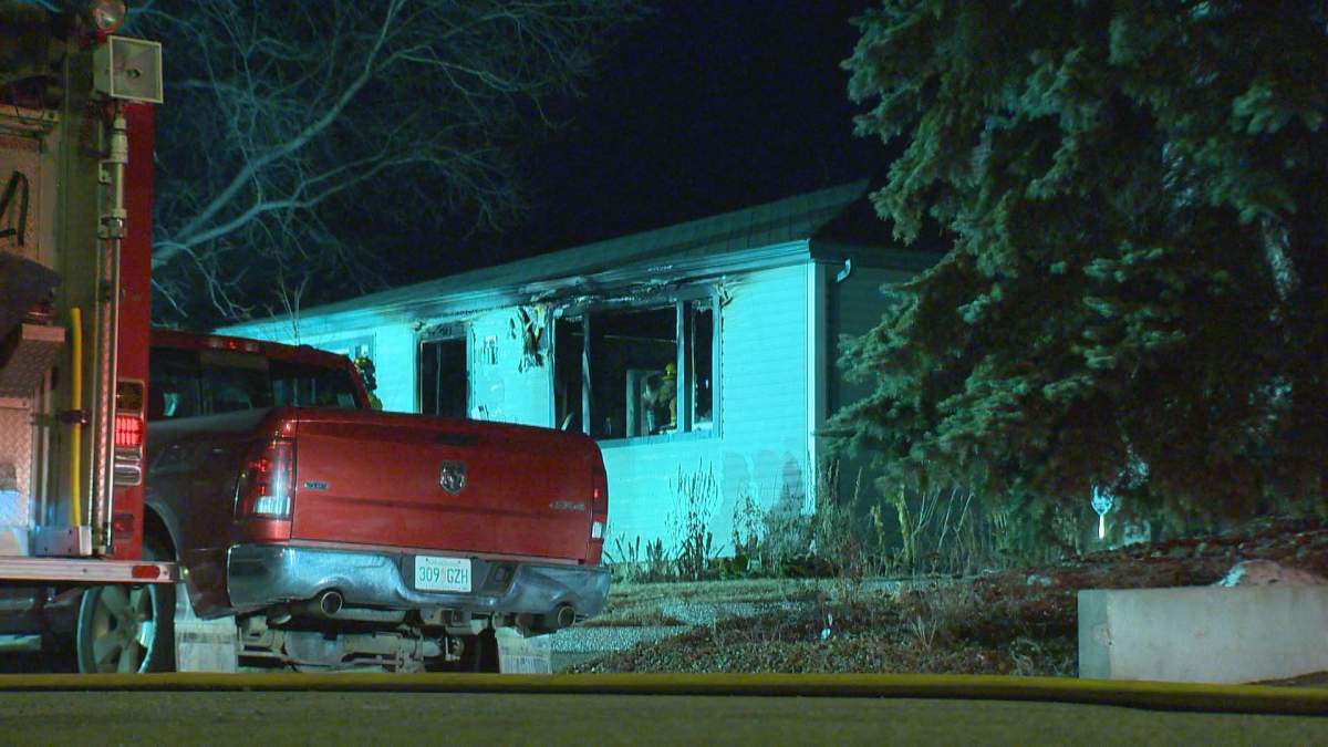 Fire crews were battling a house fire on Robinson Street near McCallum Avenue Friday evening.